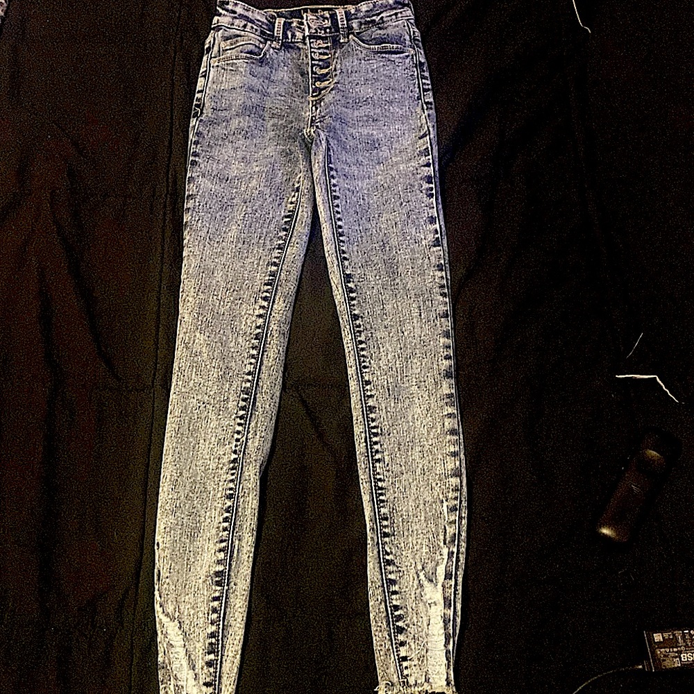 00 kids, blue jeans, rips at the ankle